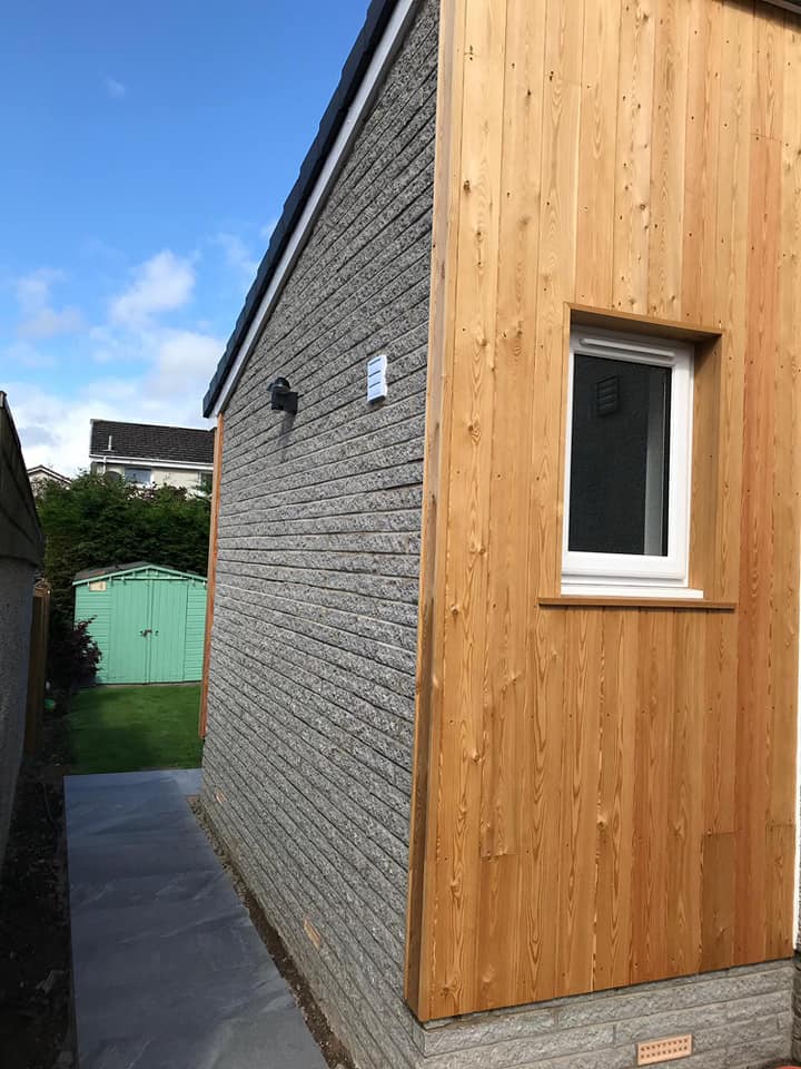 This extension compliments their existing property to add a utility, toilet, kitchen and living room, complete with bi-fold doors, velux and exterior larch cladding. We finished the project with the ground work to include laying of slabs and patio area.