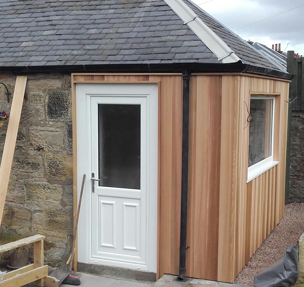 Picture window creation with cedar cladding