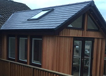 Sunroom extension - Cedar Clad with uPVC Patio Doors/Windows