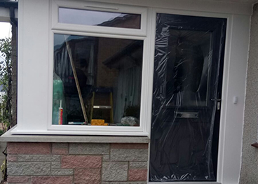 Porch extension which extends/enhance existing entrance area complete with composite front door installation.